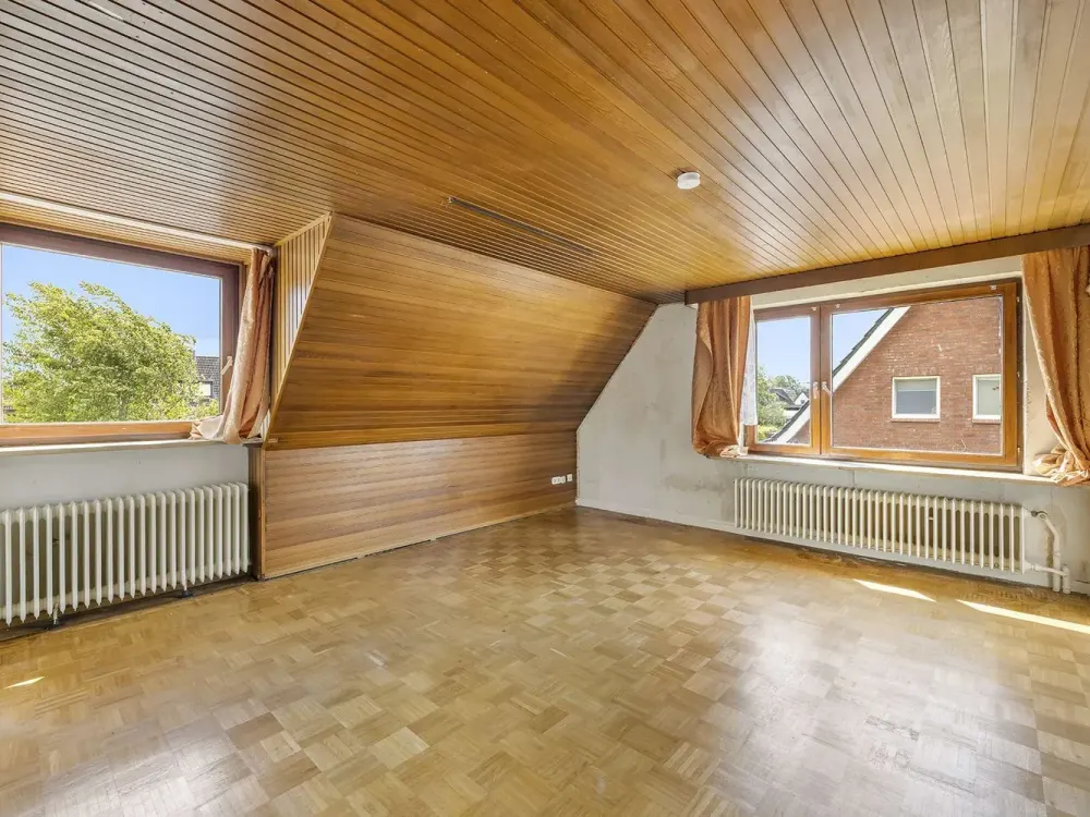 Gemütliche DG-Wohnung in gepflegter Doppelhaushälfte mit Blick ins Grüne