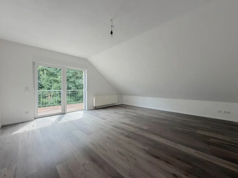 Charmante Dachgeschosswohnung mit Balkon und Blick ins Grüne in Bochum-Hofstede
