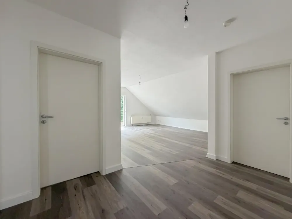 Charmante Dachgeschosswohnung mit Balkon und Blick ins Grüne in Bochum-Hofstede