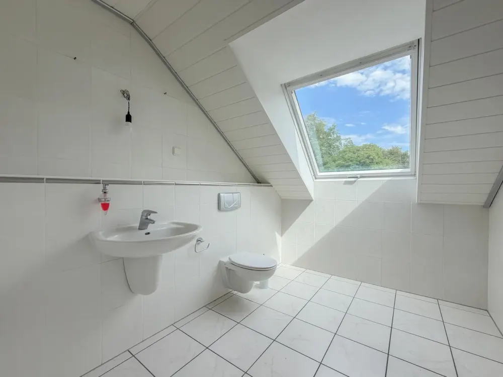 Charmante Dachgeschosswohnung mit Balkon und Blick ins Grüne in Bochum-Hofstede