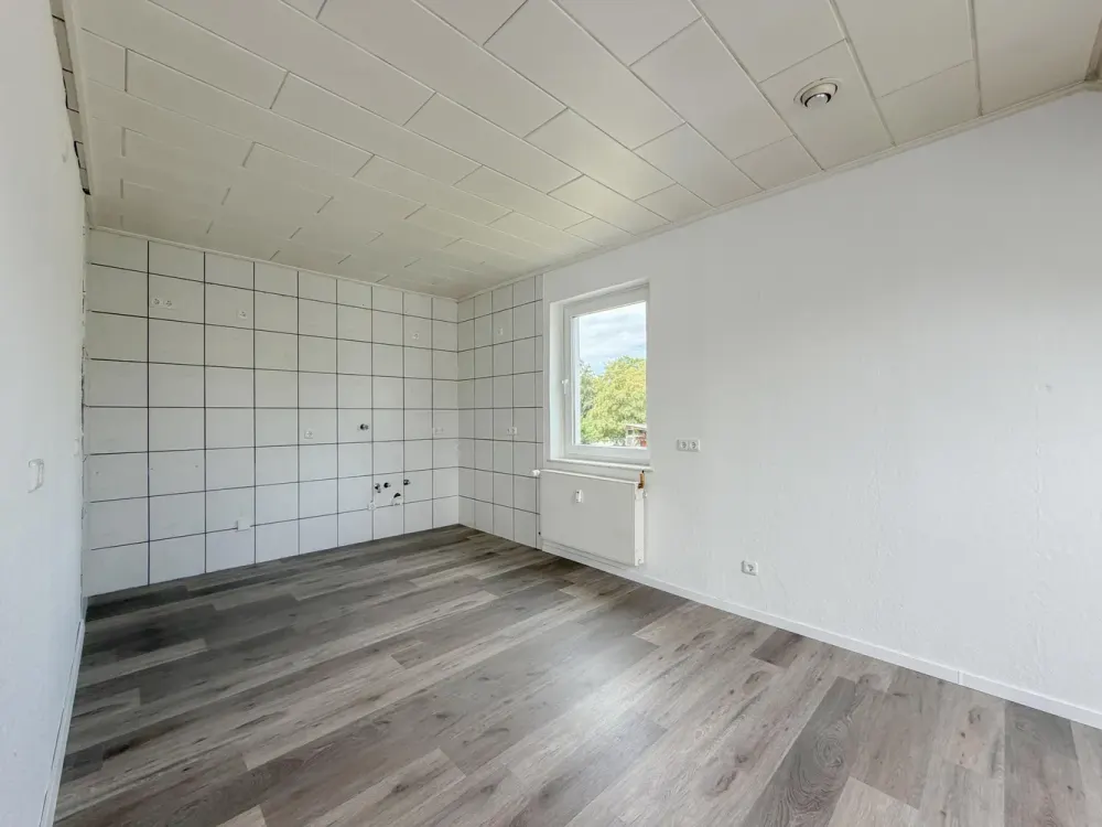 Charmante Dachgeschosswohnung mit Balkon und Blick ins Grüne in Bochum-Hofstede
