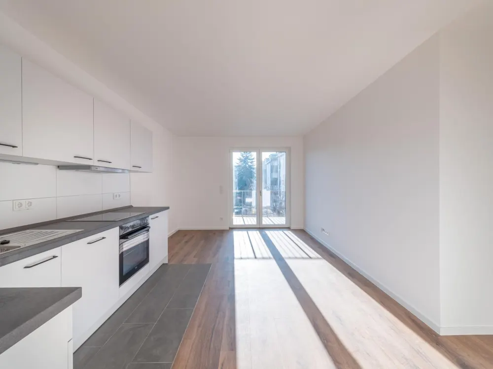 Erstbezug! - 2 Raumwohnung mit Einbauküche, Sonnenbalkon und Tiefgaragenstellplatz - WE14