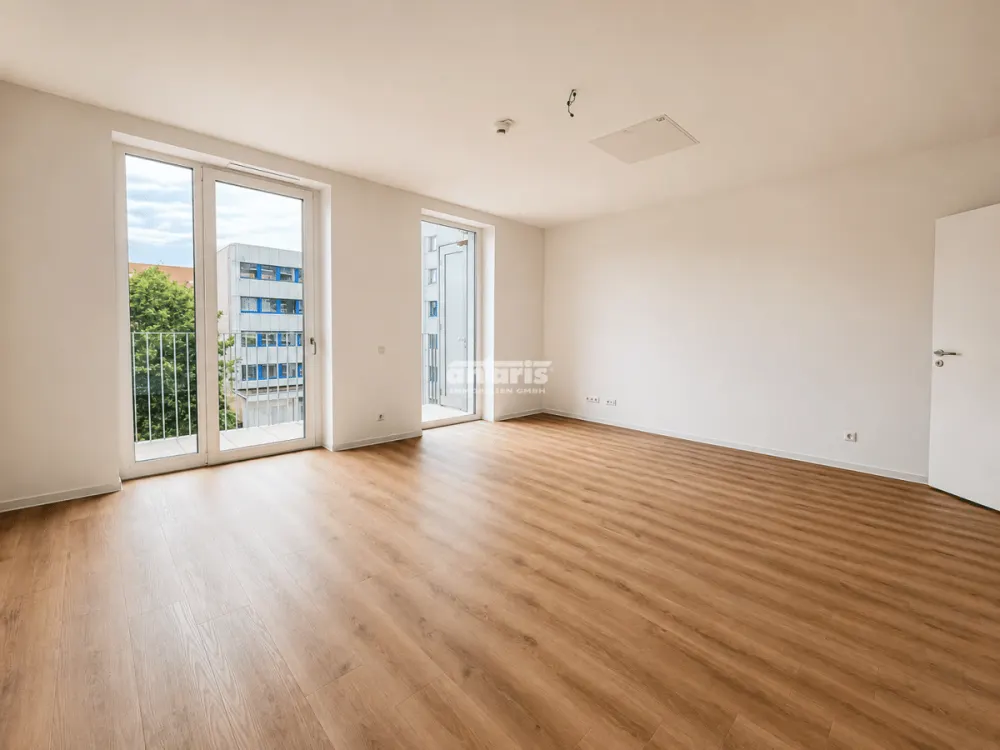 antaris Immobilien GmbH ** Modern & cozy: 2-room apartment with fitted kitchen **