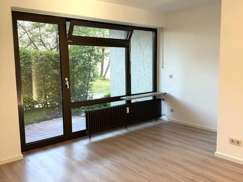 Modern sanierte 4- Zimmer- Terrassenwohnung mit Gartenblick in München