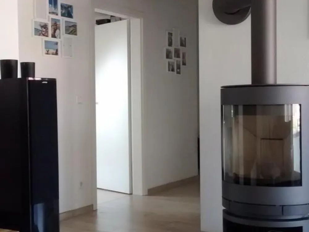 Modern 3-Room Attic Apartment with Swedish Stove, Balcony & High-Quality Features