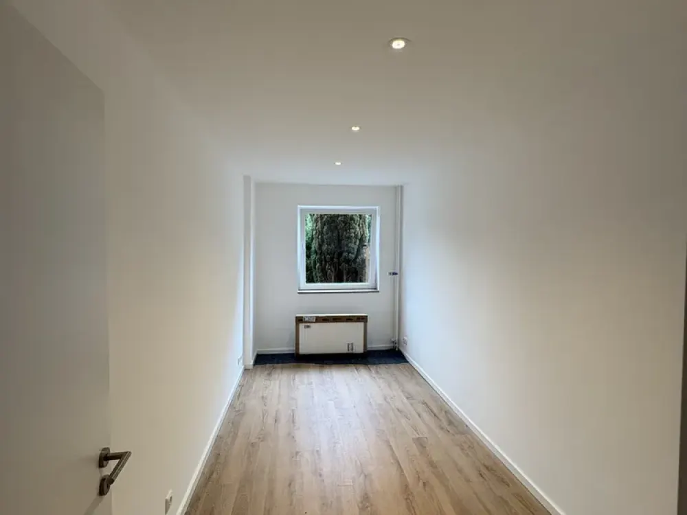 Sanierte 3-Zimmer Wohnung mit Terrasse und eigenem Garten