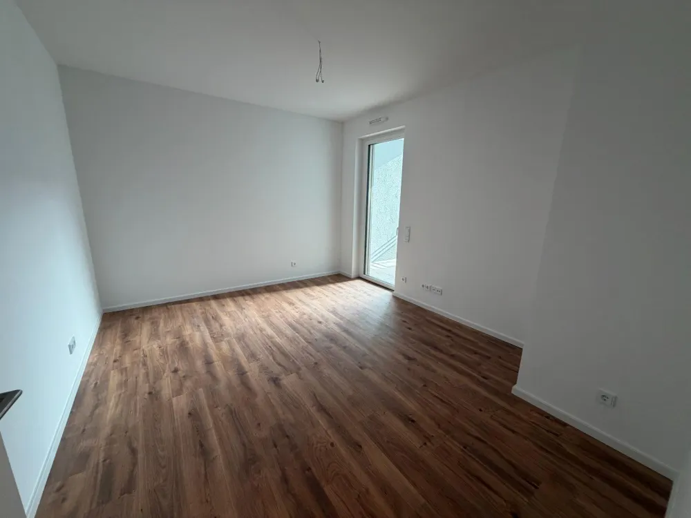 Neubau: Großzügige 3-Zimmer-Wohnung mit Premium-Küche