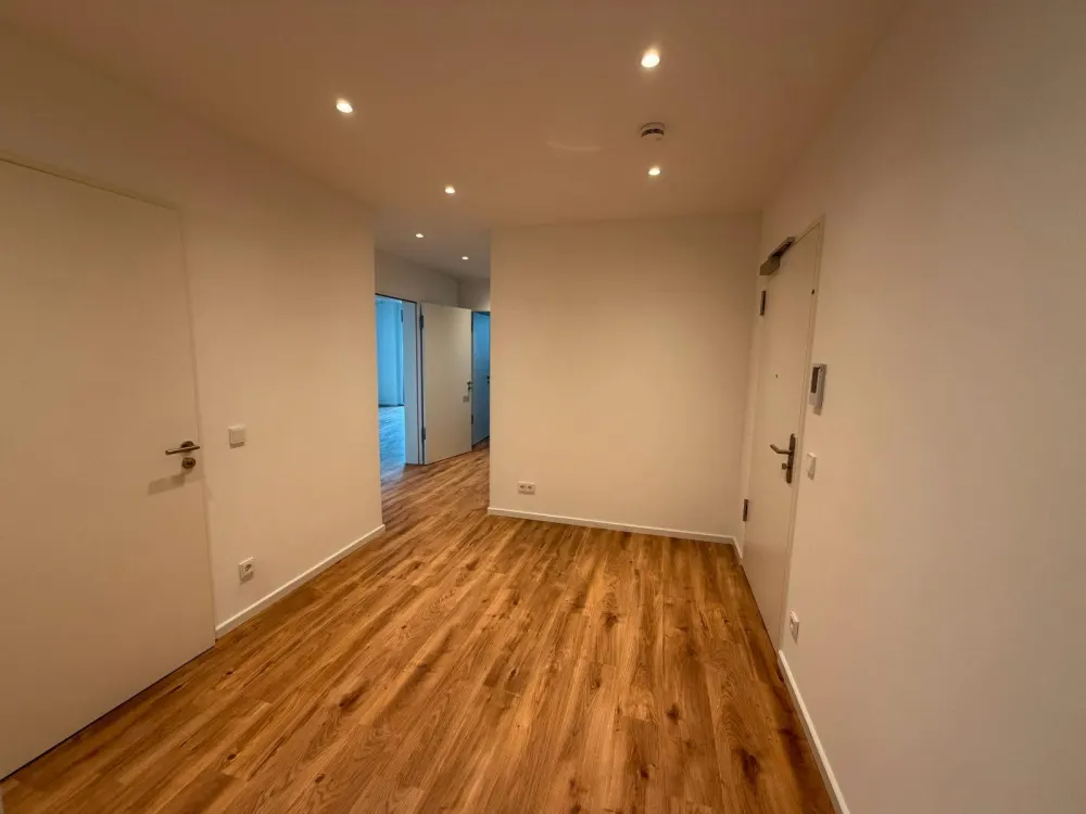 Neubau: Großzügige 3-Zimmer-Wohnung mit Premium-Küche