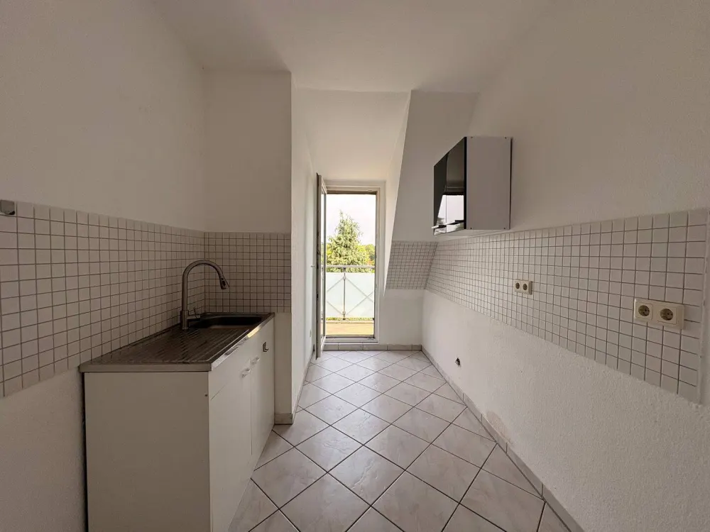 Wohnen über den Dächern: 3-Zimmer-DG-Wohnung mit Balkon!