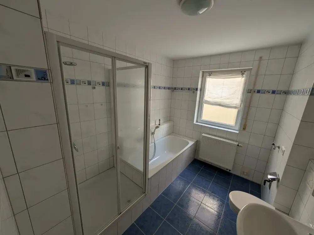 3-Zimmer-Wohnung im Erdgeschoss mit Terrasse, Garten & Tiefgarage in Rheinzabern