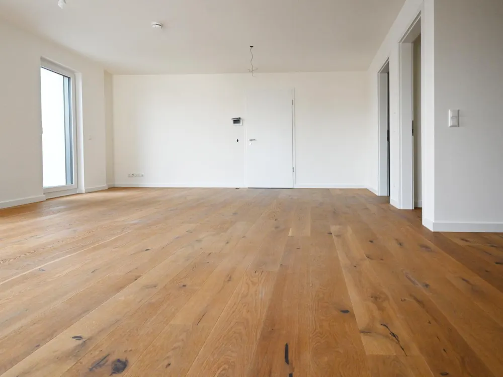 Neubau - Erstbezug geräumige 2 ZKB Balkon + Abstellraum