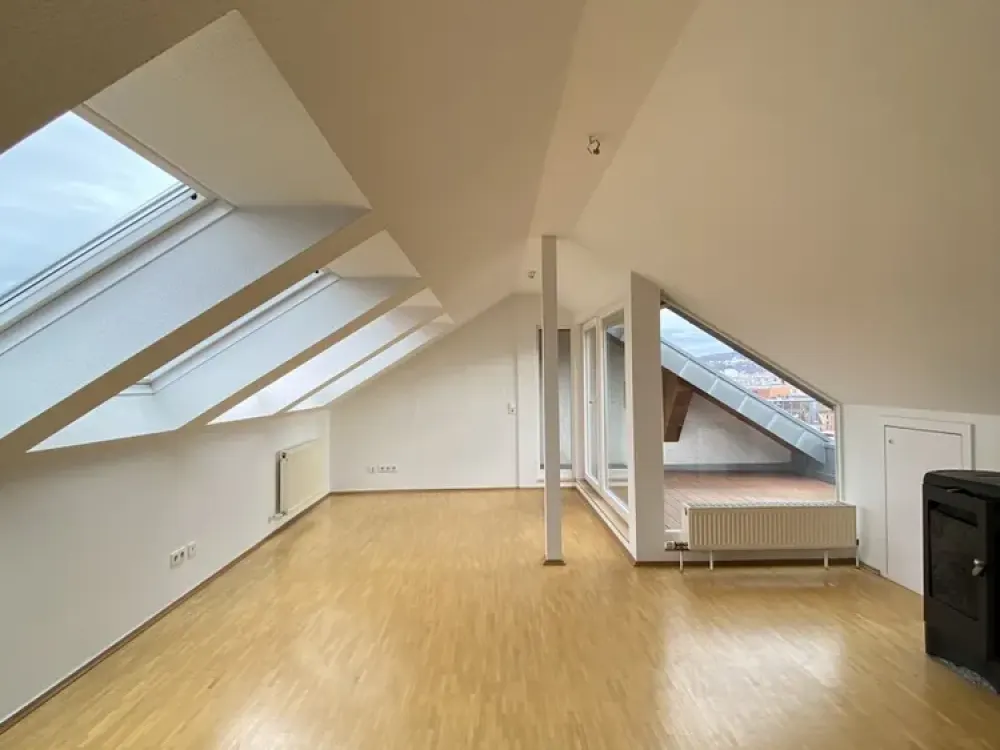 4-Zimmer-Dachgeschosswohnung mit Kamin & Sonnenterrasse