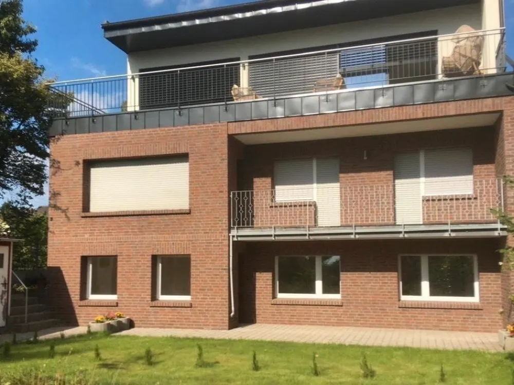 3-Zimmer-Terrassenwohnung am Rhein mit eigenem Garten+Einbauküche