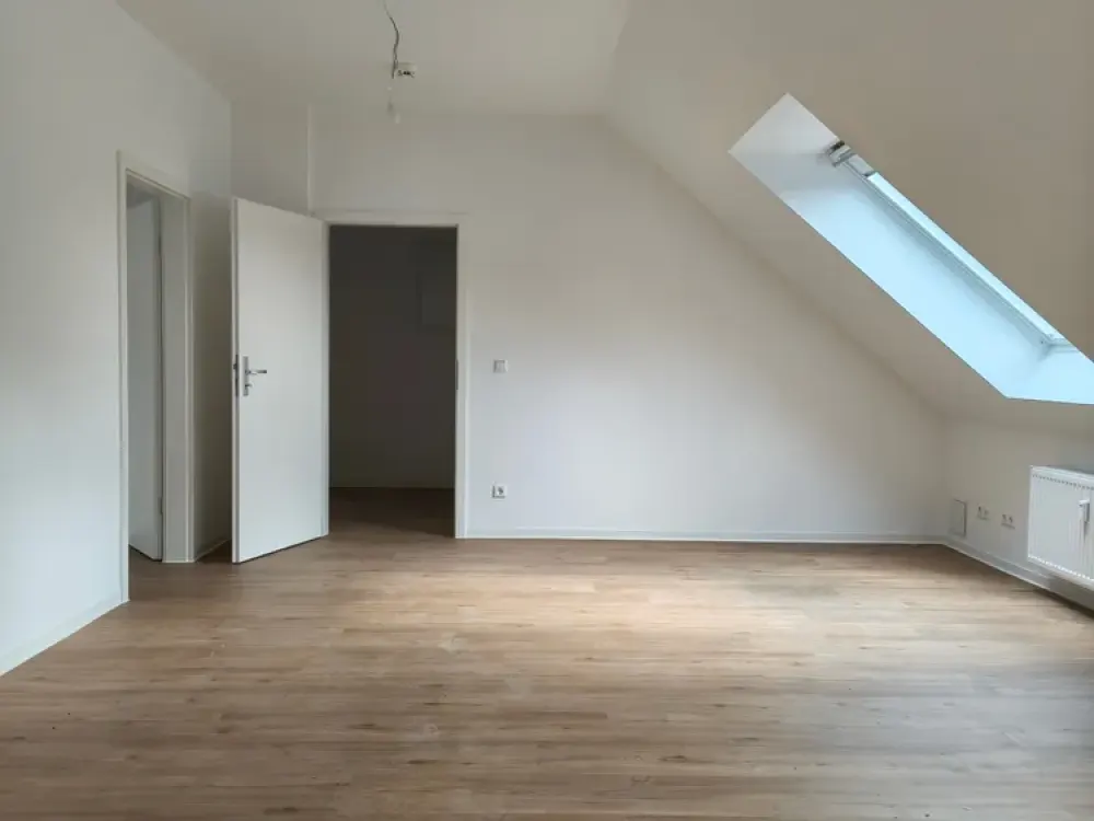 Erstbezug: 3-Zimmer im DG