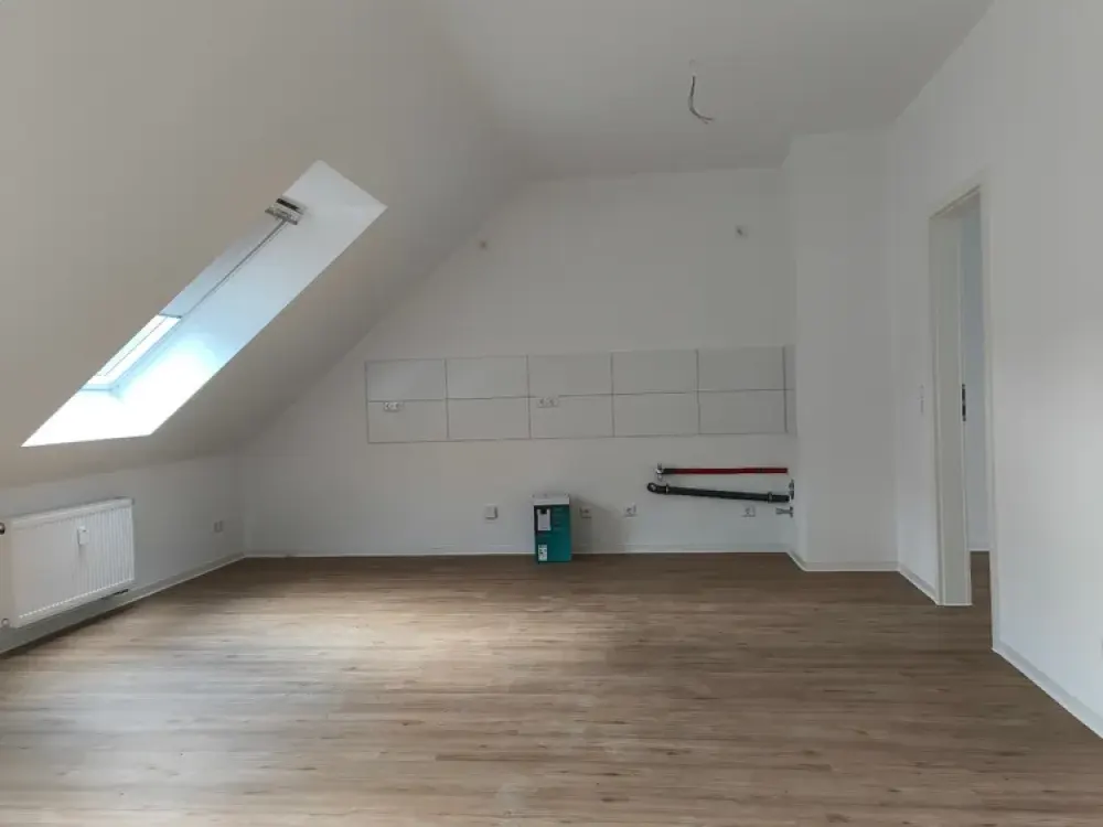 Erstbezug: 3-Zimmer im DG
