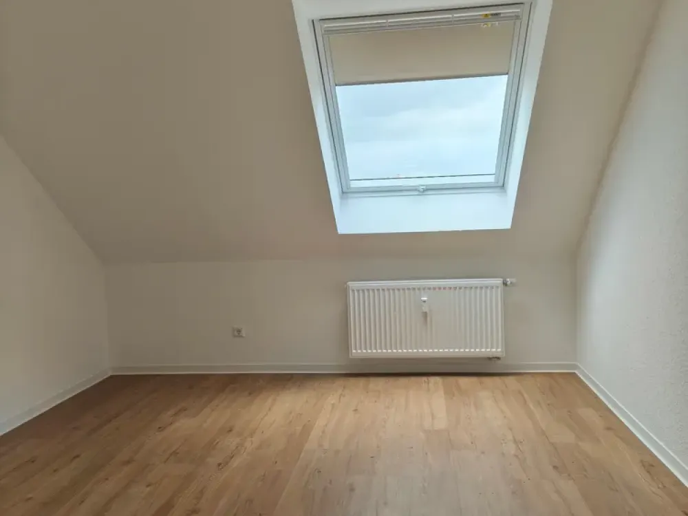 Erstbezug: 3-Zimmer im DG