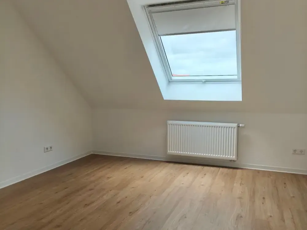 Erstbezug: 3-Zimmer im DG