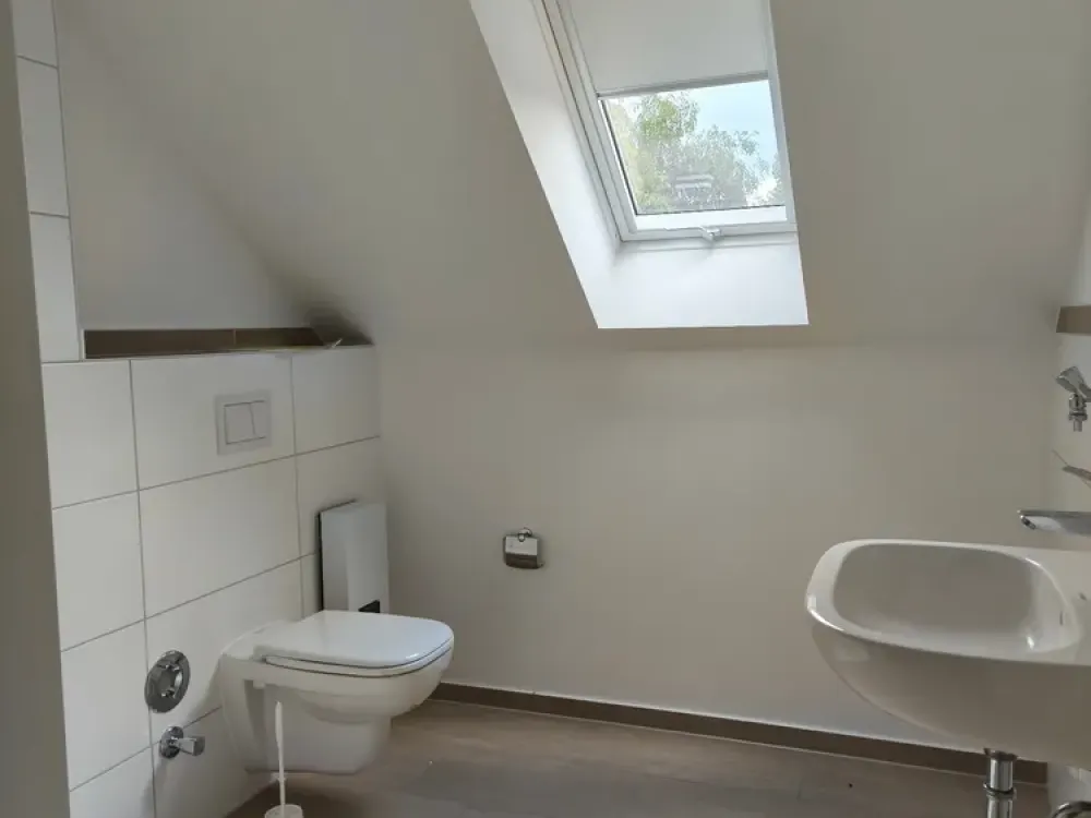 Erstbezug: 3-Zimmer im DG