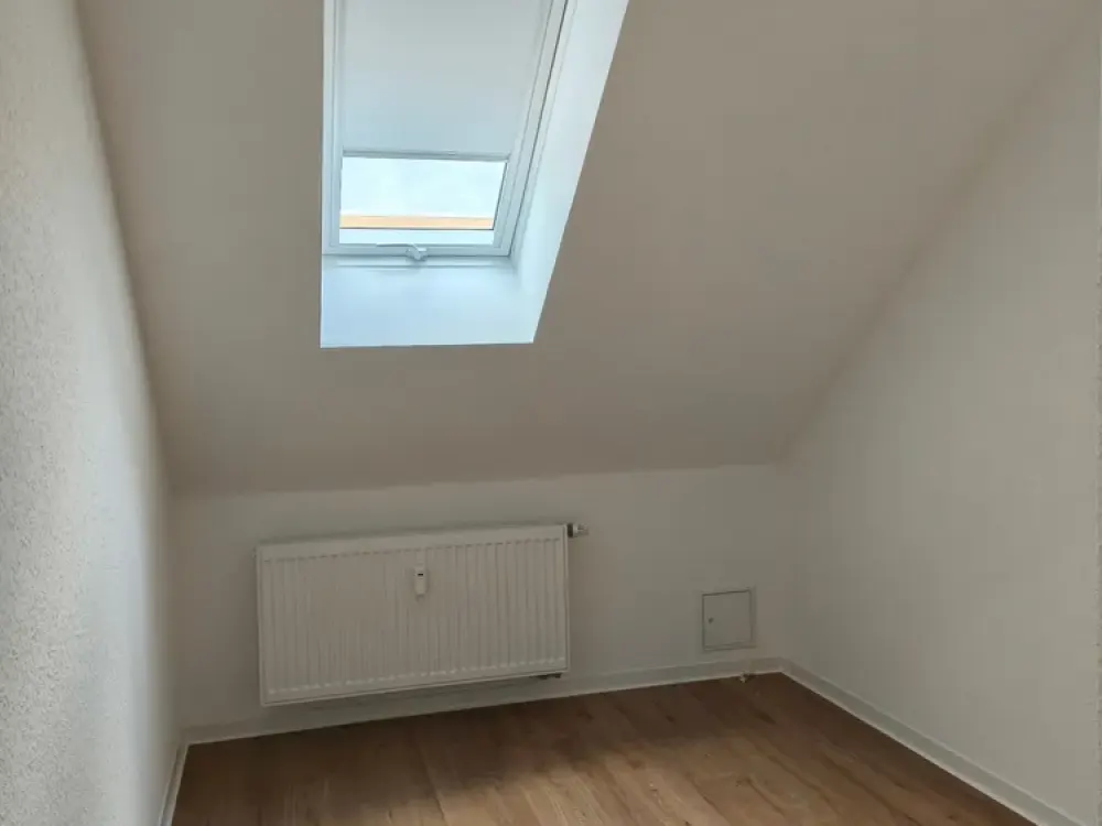 Erstbezug: 3-Zimmer im DG