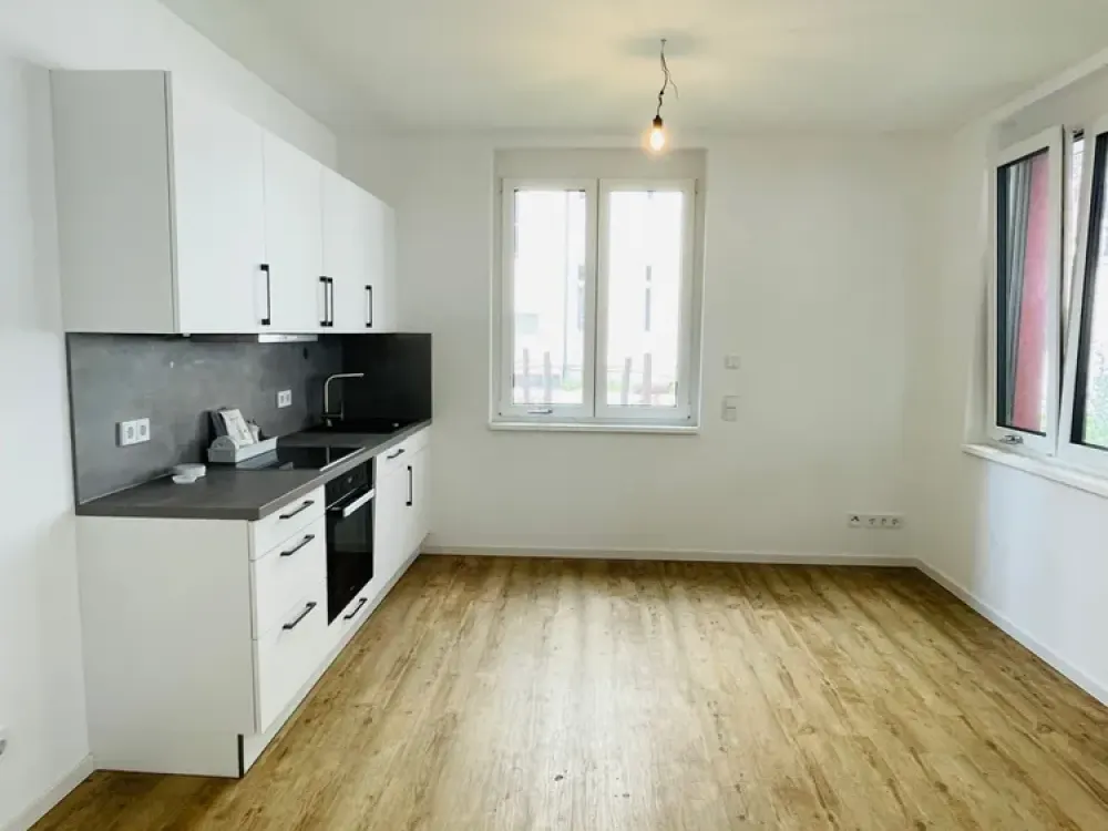 Schicke Neubauwohnung mit eigener Terrasse und EBK sucht neue Bewohner!