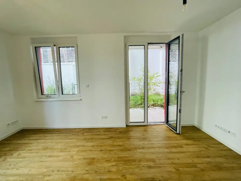 Schicke Neubauwohnung mit eigener Terrasse und EBK sucht neue Bewohner!