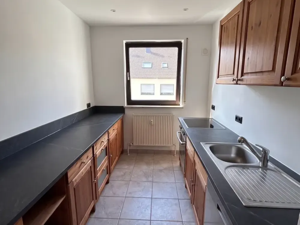 3-Zimmer Wohnung mit Balkon, Einbauküche und Außenstellplatz in Wolkersdorf.