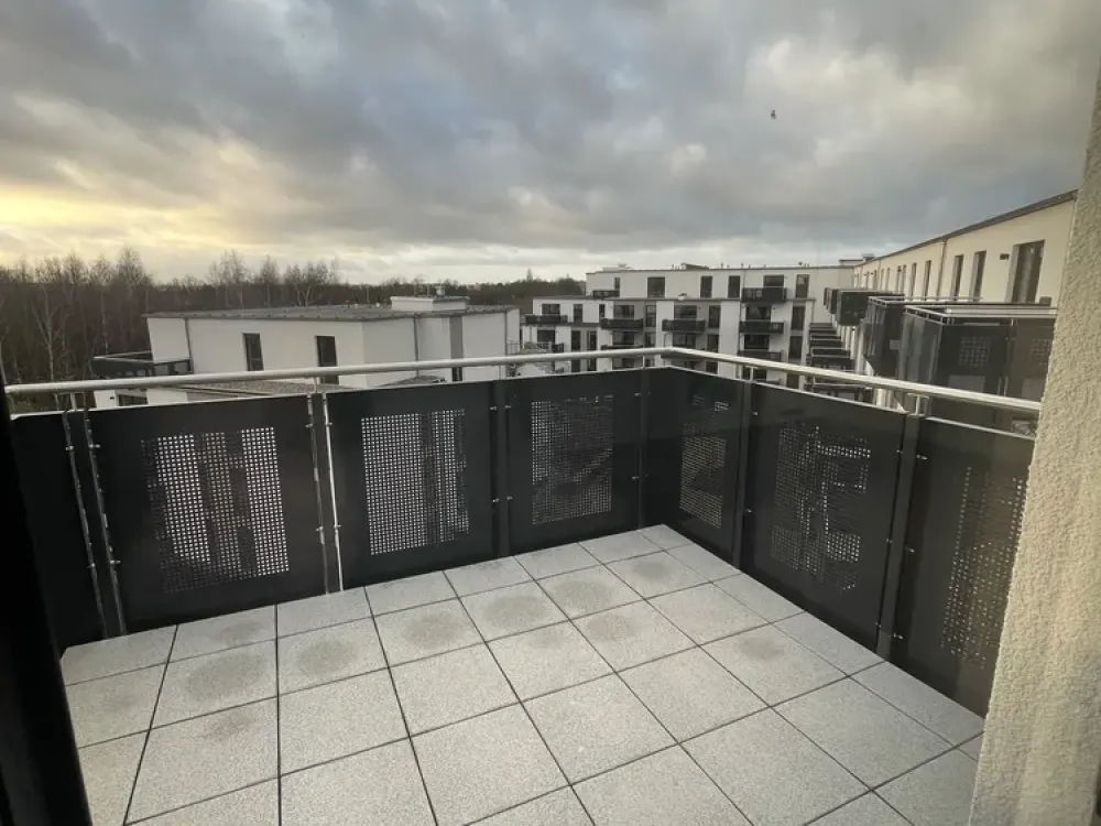 Barrier-free new-build apartment with fitted kitchen, south-facing balcony, real wood parquet, elevator, underground parking