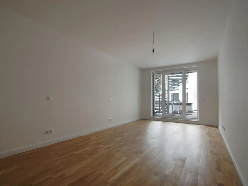 Erstbezug! Exklusive 3-Zimmer-Wohnung im 2. OG mit Terrasse, hochwertiger Neubau in Stadtmitte