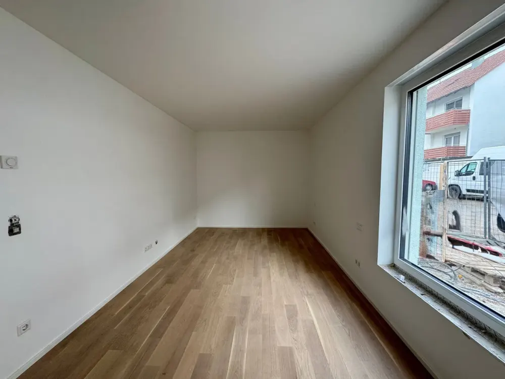Sonnige Erdgeschosswohnung mit Balkon
