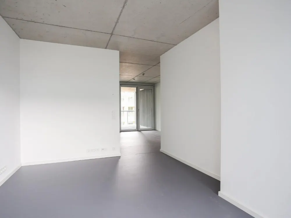 Fühlt sich an wie 3 Zimmer - mit stylischen Sichtbetondecken im 6. OG eines modernen Neubaus