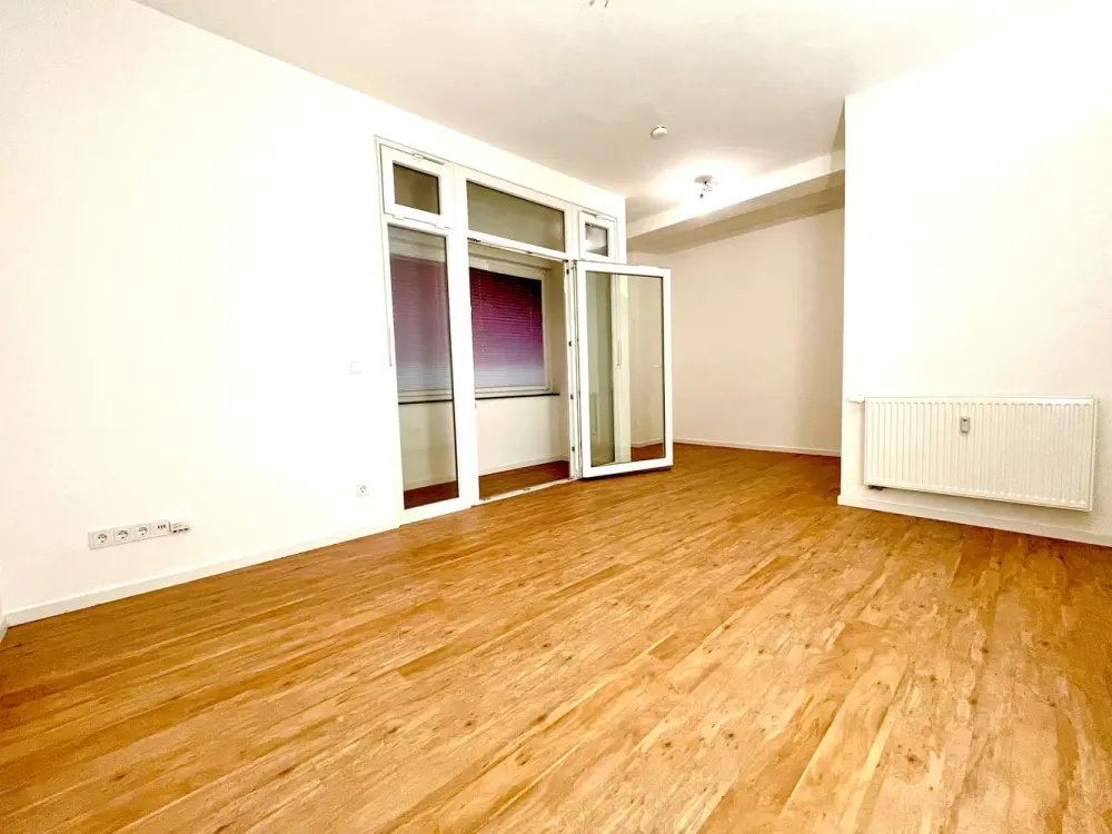 Renovierte Erdgeschosswohnung mit Terrasse und offen-moderner Küche