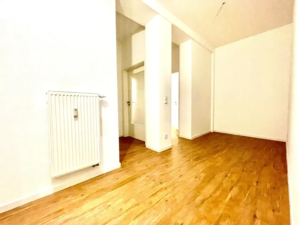 Renovierte Erdgeschosswohnung mit Terrasse und offen-moderner Küche