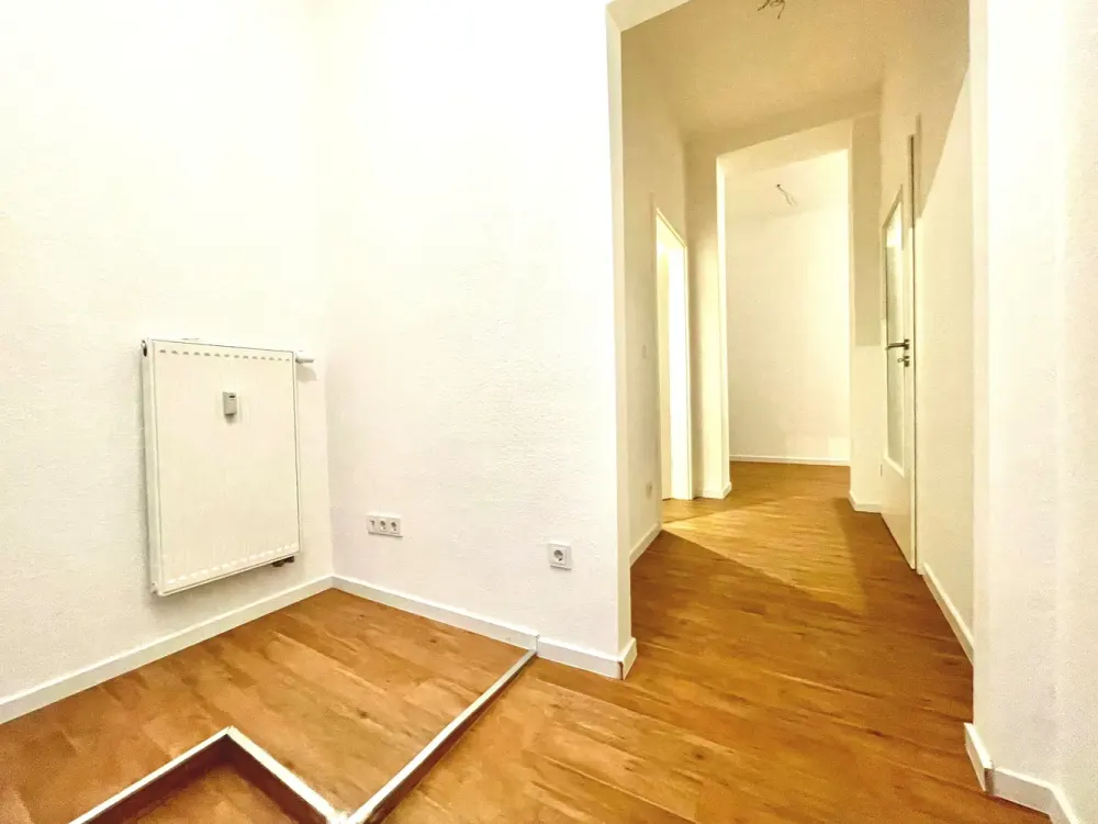 Renovierte Erdgeschosswohnung mit Terrasse und offen-moderner Küche