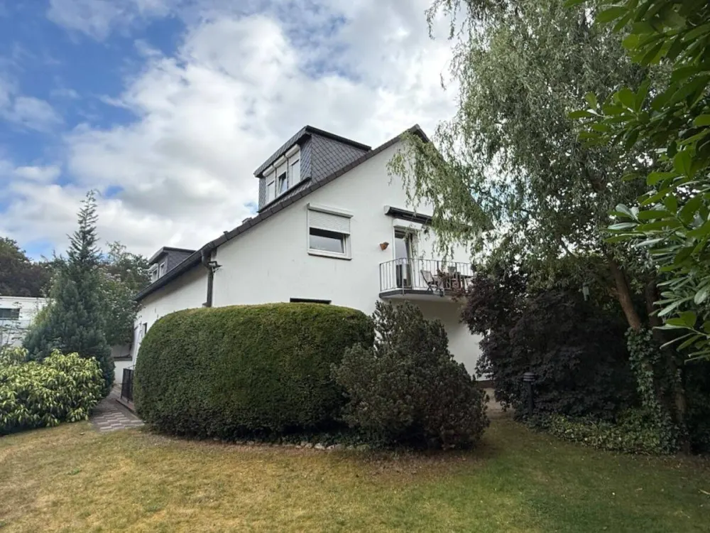 Terrassenwohnung im 2-Familienhaus