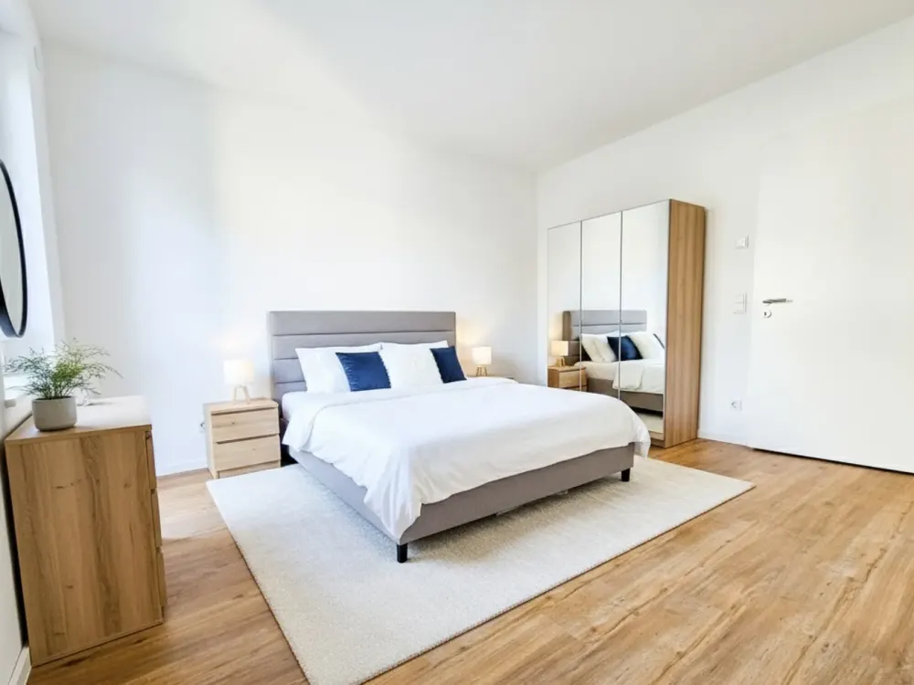 Neubaukomfort im Erstbezug: Helle 3-Zimmerwohnung mit zwei Balkonen, EBK und Tiefgaragenstellplatz