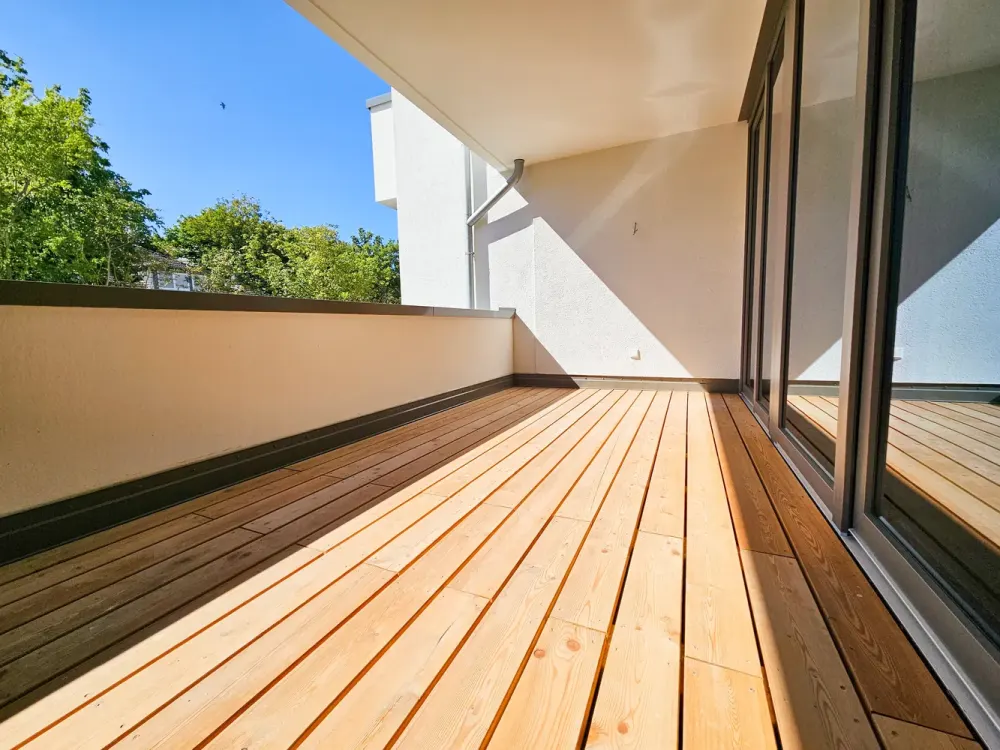 Neubaukomfort im Erstbezug: Helle 3-Zimmerwohnung mit zwei Balkonen, EBK und Tiefgaragenstellplatz