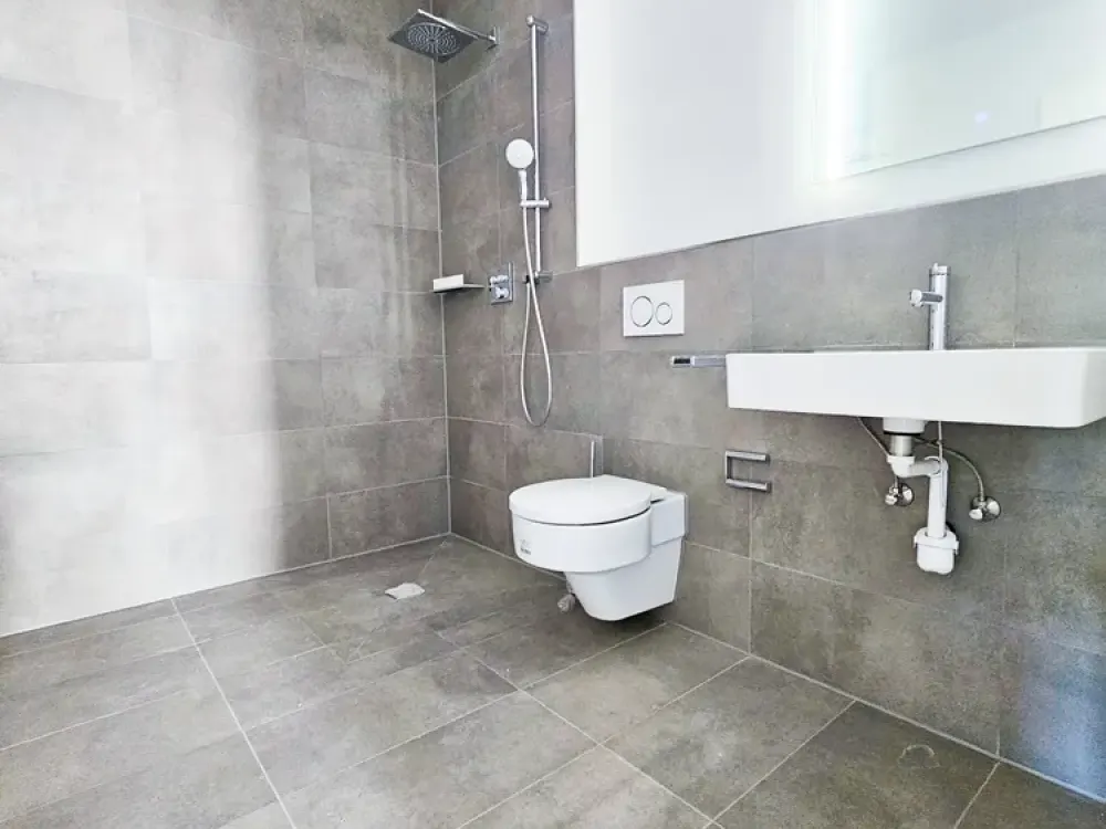 Neubaukomfort im Erstbezug: Helle 3-Zimmerwohnung mit zwei Balkonen, EBK und Tiefgaragenstellplatz