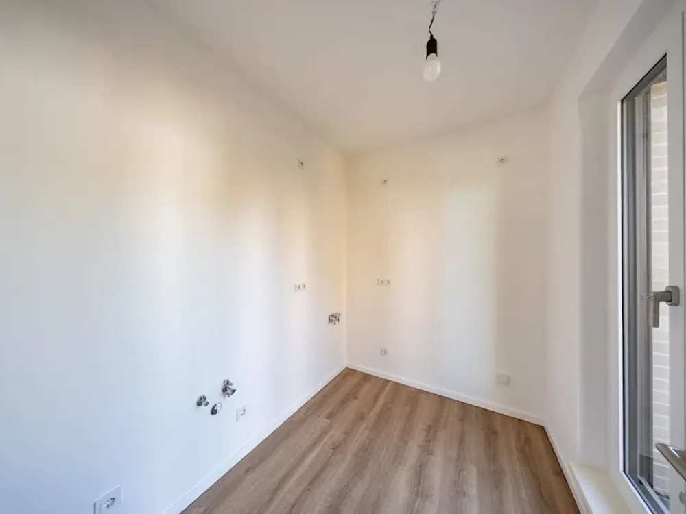Neubauwohnung im Erstbezug mit Fußbodenheizung und Balkon / WBS 220 erforderlich