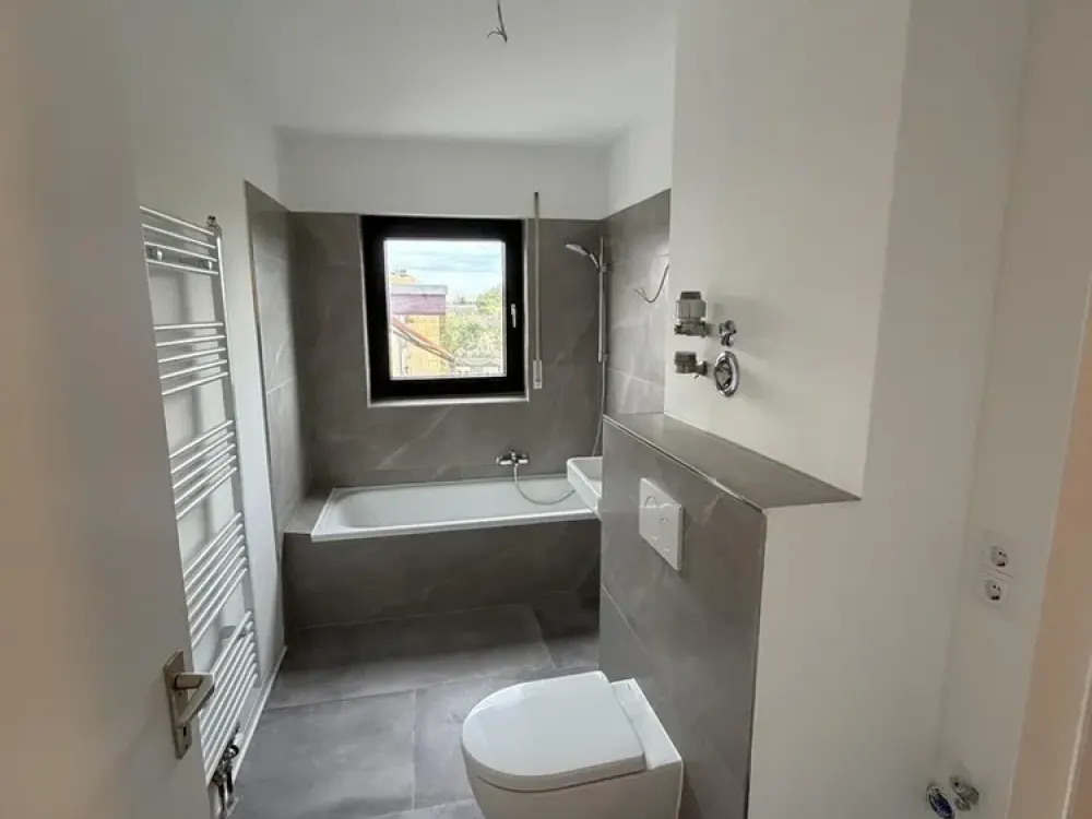 First Occupancy After Complete Renovation - Exclusive 3-Room Apartment with South-Facing Loggia