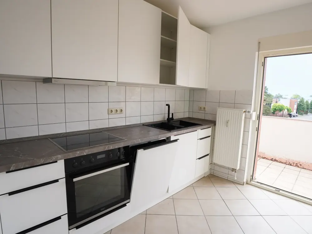 Charmante Wohnung mit Balkon und Außenstellplatz (2. OG Mitte)