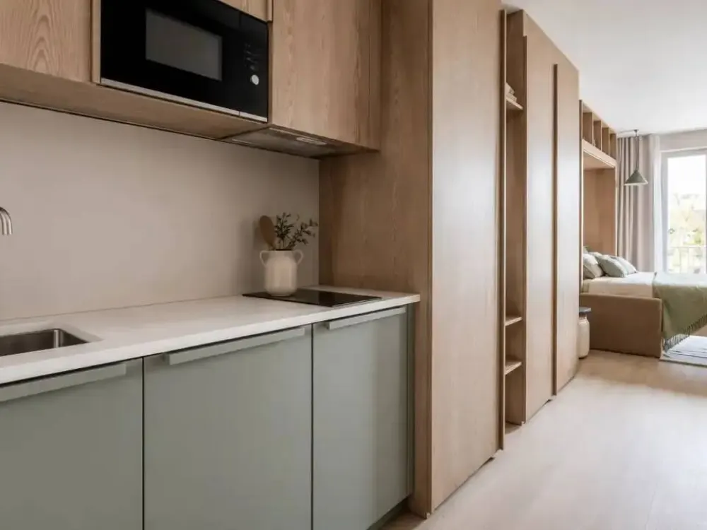 2 Monate mietfrei - Möbliertes Studio-Apartment mit Padel, Fitnessstudio, Dachterrasse & mehr