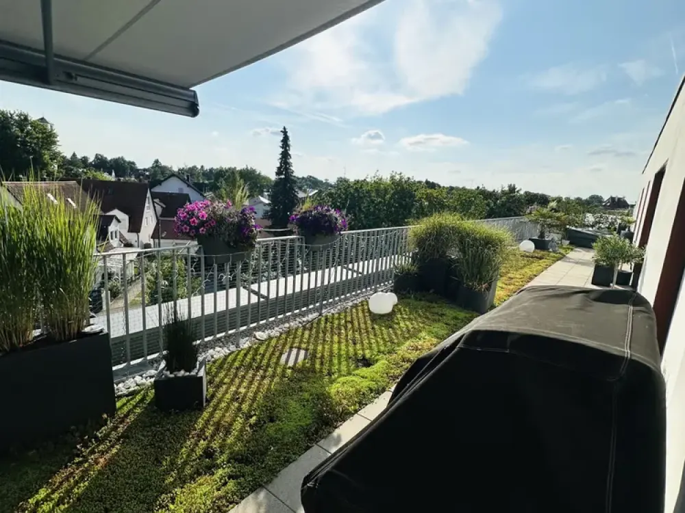 Penthouse in Allach mit atemberaubendem Alpenblick und großzügigem Südbalkon.