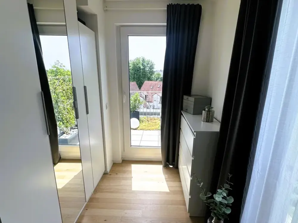 Penthouse in Allach mit atemberaubendem Alpenblick und großzügigem Südbalkon.