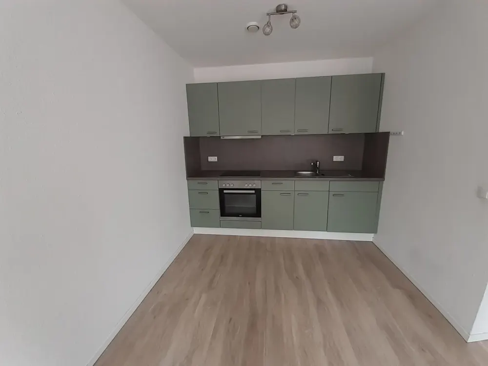 Schöne 2 Zimmer-Single-Wohnung mit eigener Dachterrasse