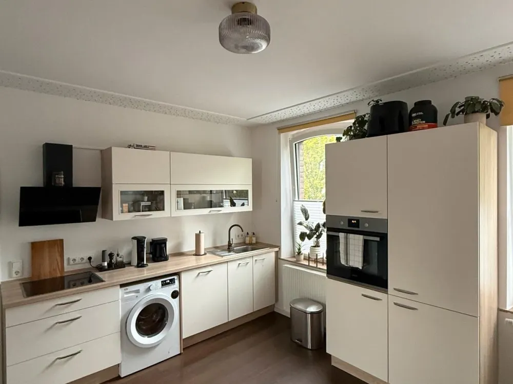 Charming 84m² Maisonette Apartment in Osterath with Garden & Fitted Kitchen