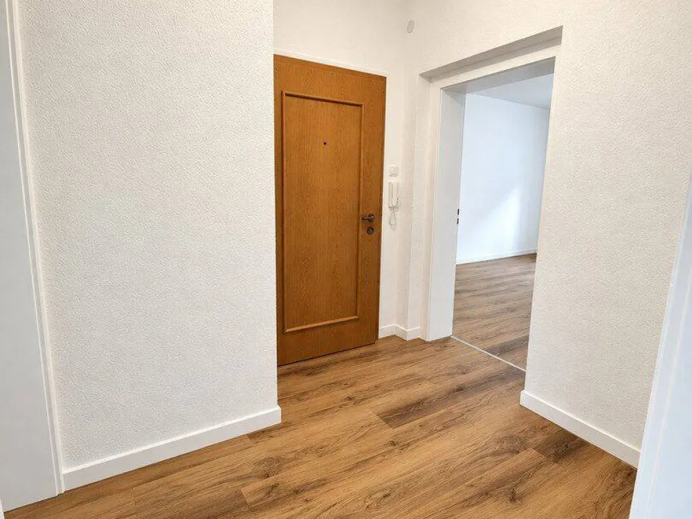 Erstbezug nach Sanierung! Stilvolle 2-Zimmer-Wohnung mit Wintergarten in TOP-Lage