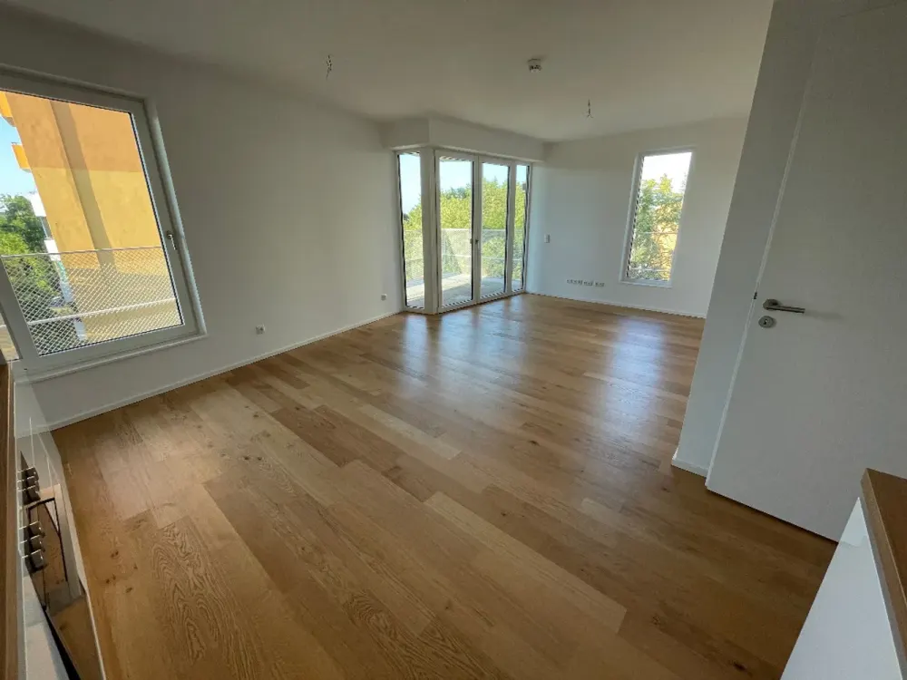 Modern living with two bathrooms, spacious balcony and fitted kitchen