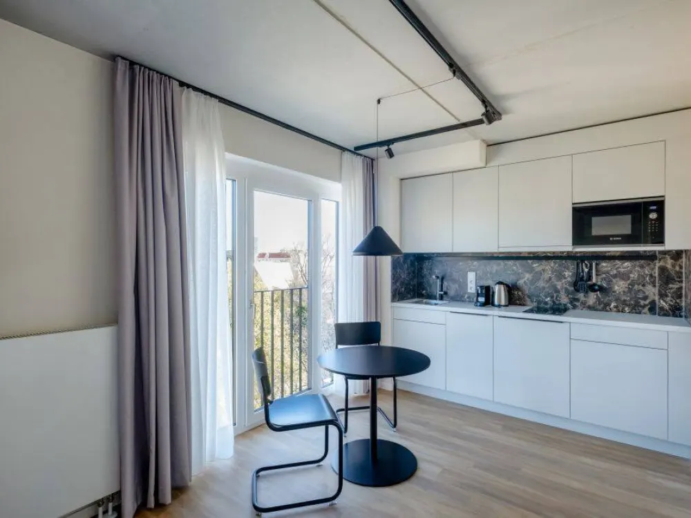 City West Living: Modernes Apartment mit Gym, Coworking & Rooftop am Schloss Charlottenburg
