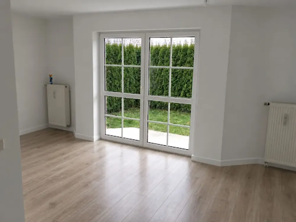 Renovierte 1,5-Zimmer-Wohnung mit Garten, Stellplatz und Keller