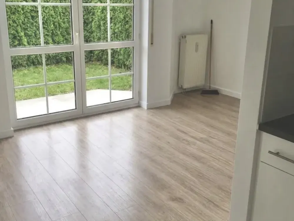 Renovierte 1,5-Zimmer-Wohnung mit Garten, Stellplatz und Keller